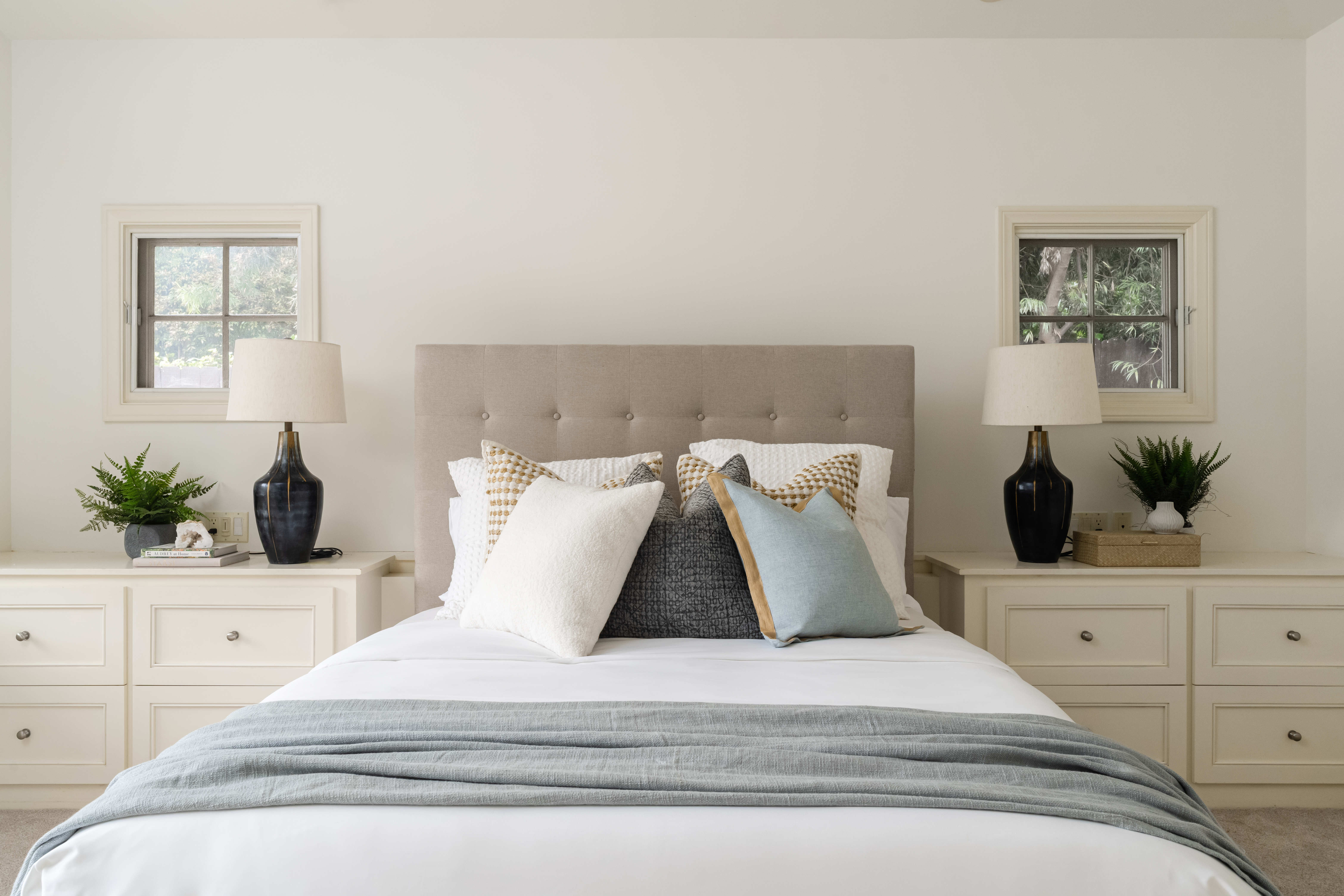 La Jolla staged bedroom tufted headboard