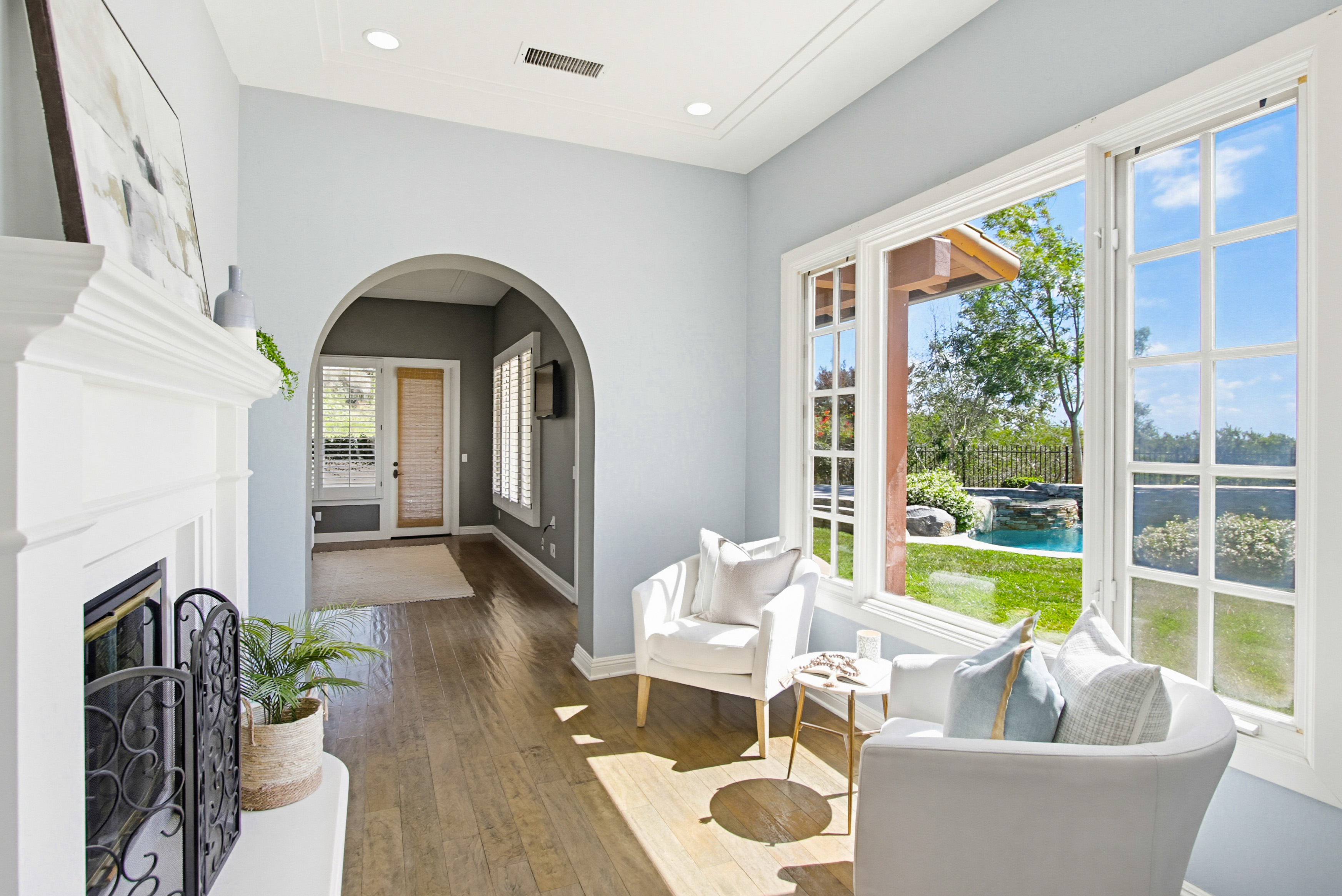 Staged sunroom pool view San Diego Santaluz